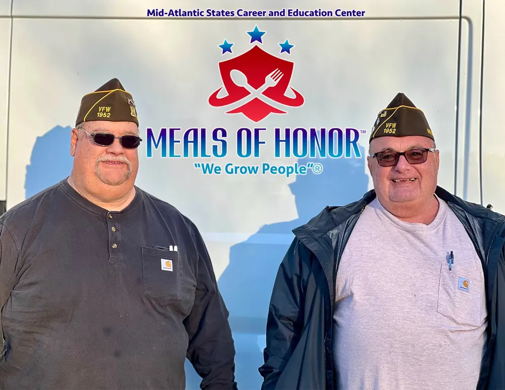 Two volunteers from Meals of Honor